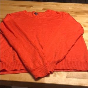 Men’s orange sweater